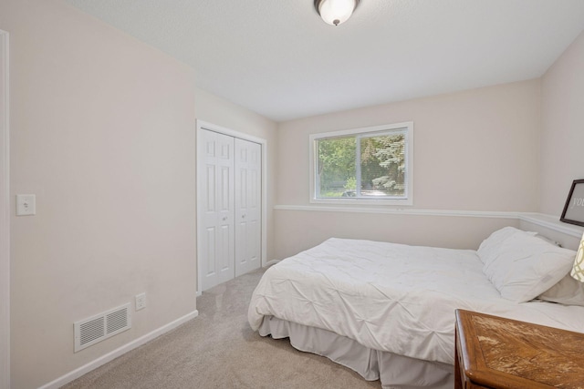 6520 Nathan Ln N, Maple Grove, MN 55369 - carpeted bedroom featuring a closet and baseboards