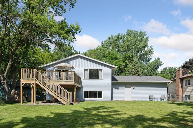 6520 Nathan Ln N, Maple Grove, MN 55369 - back of property with stairway, a deck, and roof with shingles