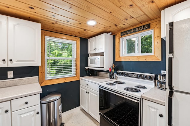 51122 Long Point Pl, Mcgregor, MN 55760 - kitchen with white appliances, wooden ceiling, light countertops, white cabinets, and recessed lighting