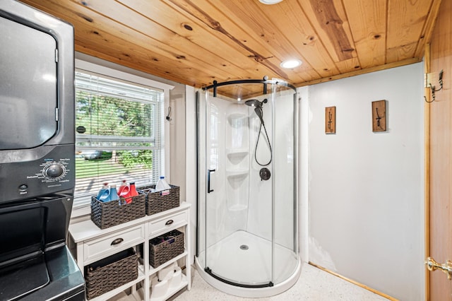 51122 Long Point Pl, Mcgregor, MN 55760 - full bathroom with estacked washer and dryer, wood ceiling, a shower stall, and speckled floor