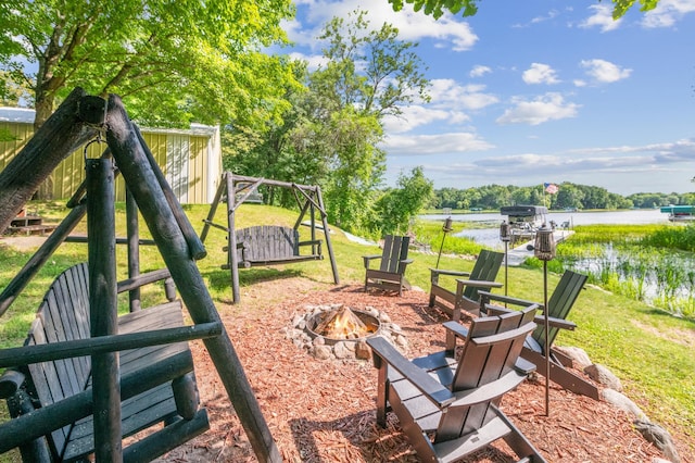 51122 Long Point Pl, Mcgregor, MN 55760 - view of green lawn featuring an outdoor fire pit and a water view