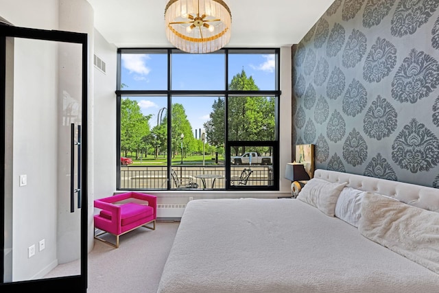 215 10th Ave S Unit 112, Minneapolis, MN 55415 - bedroom featuring carpet floors and floor to ceiling windows
