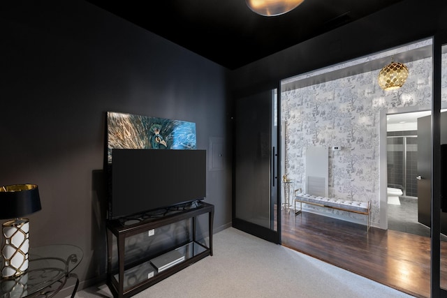 215 10th Ave S Unit 112, Minneapolis, MN 55415 - carpeted bedroom with baseboards and ensuite bath
