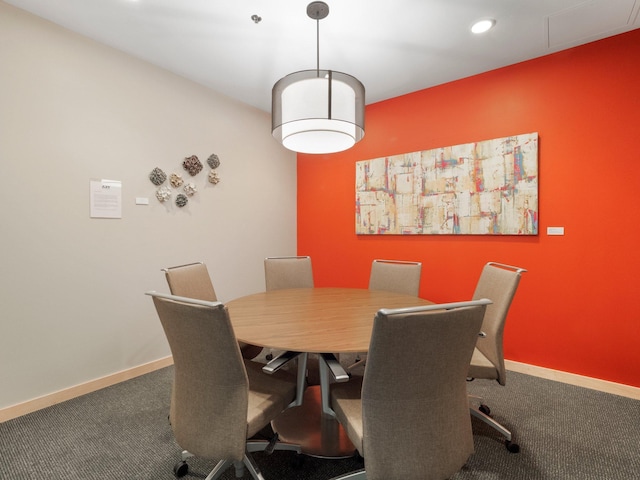 215 10th Ave S Unit 112, Minneapolis, MN 55415 - carpeted dining space featuring baseboards and recessed lighting