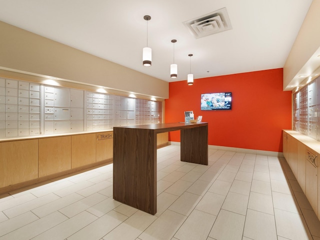 215 10th Ave S Unit 112, Minneapolis, MN 55415 - unfurnished office featuring mail area and light tile patterned flooring