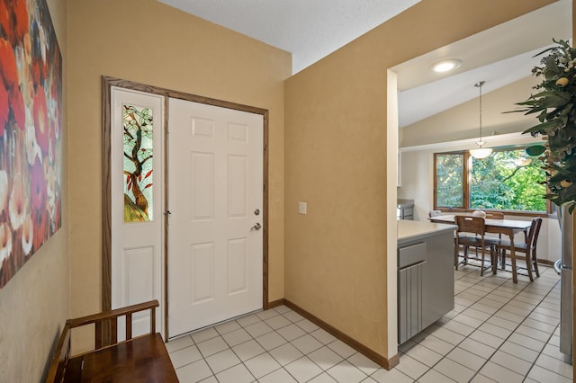 11409 Bren Rd, Minnetonka, MN 55343 - entryway featuring lofted ceiling and light tile patterned flooring