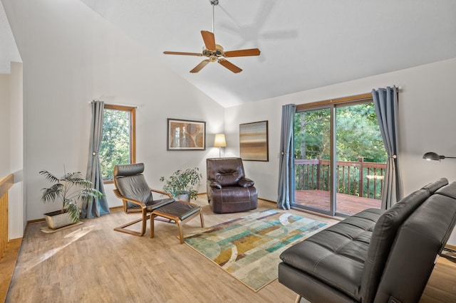 11409 Bren Rd, Minnetonka, MN 55343 - living room featuring high vaulted ceiling, ceiling fan, and wood finished floors
