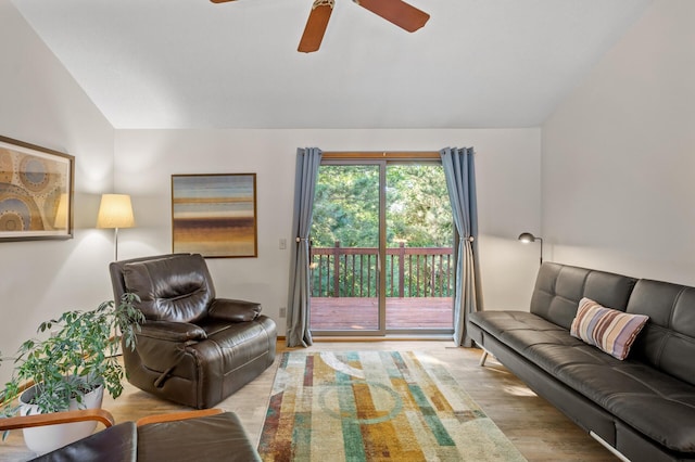 11409 Bren Rd, Minnetonka, MN 55343 - living room featuring vaulted ceiling, ceiling fan, and wood finished floors
