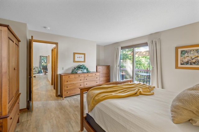 11409 Bren Rd, Minnetonka, MN 55343 - bedroom featuring light wood-style floors and access to outside