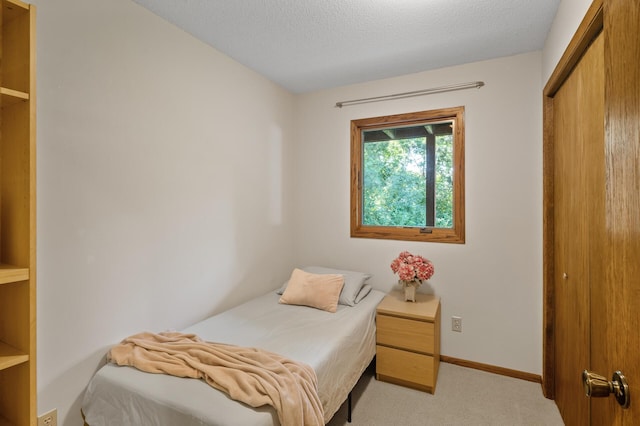 11409 Bren Rd, Minnetonka, MN 55343 - bedroom featuring light colored carpet and a textured ceiling