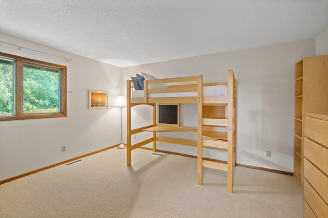 11409 Bren Rd, Minnetonka, MN 55343 - bedroom with carpet flooring and a textured ceiling