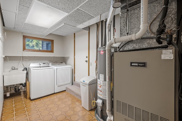 11409 Bren Rd, Minnetonka, MN 55343 - laundry area featuring washing machine and clothes dryer and water heater