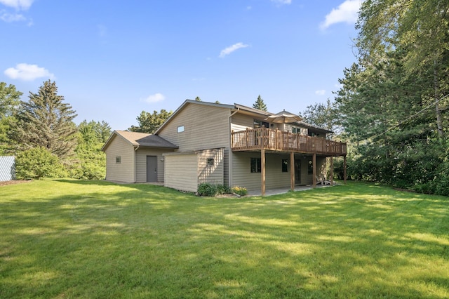 11409 Bren Rd, Minnetonka, MN 55343 - back of property with a wooden deck, a lawn, and a patio