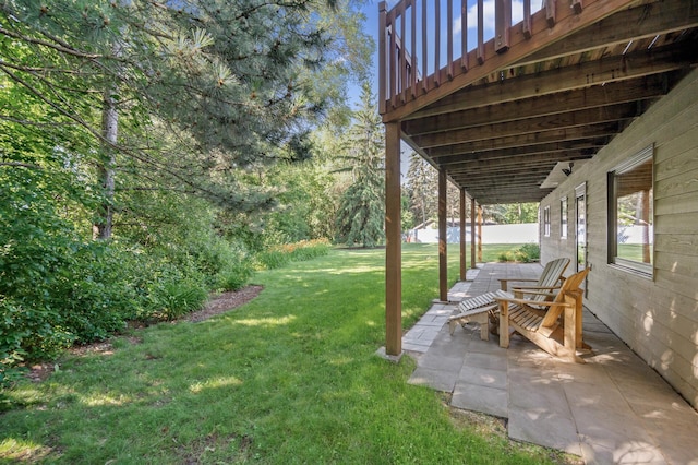 11409 Bren Rd, Minnetonka, MN 55343 - view of grassy yard featuring a patio