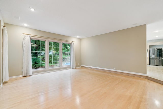 7005 Valley View Rd, Edina, MN 55439 - unfurnished room featuring light wood finished floors and recessed lighting