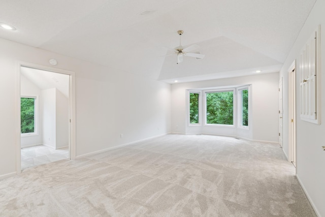 7005 Valley View Rd, Edina, MN 55439 - carpeted spare room featuring vaulted ceiling, ceiling fan, plenty of natural light, recessed lighting, and a smoke detector