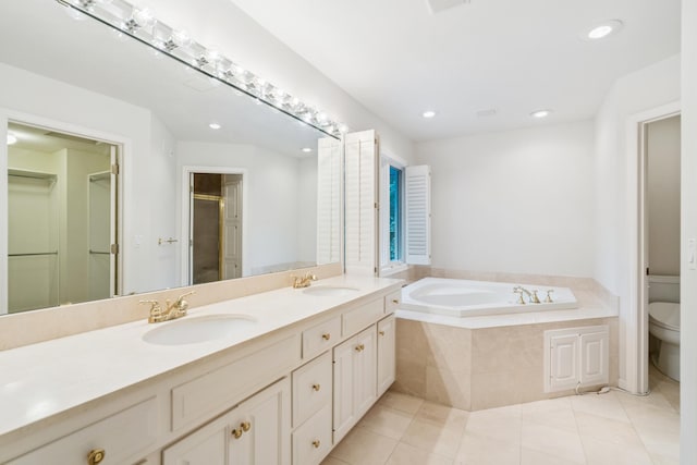 7005 Valley View Rd, Edina, MN 55439 - full bathroom featuring a garden tub, double vanity, tile patterned floors, recessed lighting, and a shower stall