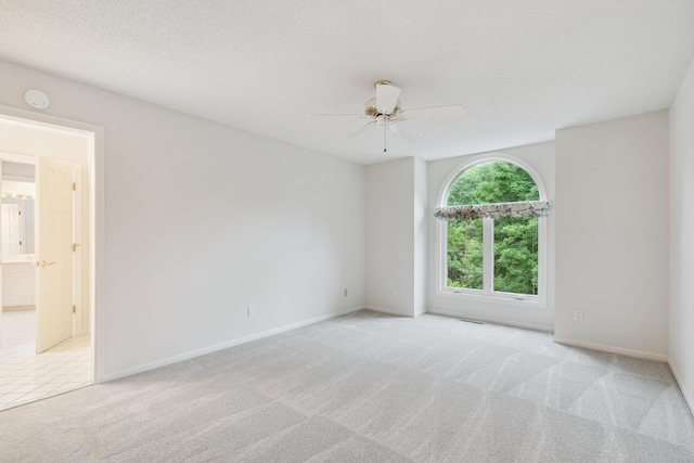 7005 Valley View Rd, Edina, MN 55439 - carpeted empty room with a ceiling fan and baseboards