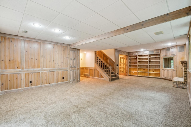7005 Valley View Rd, Edina, MN 55439 - finished below grade area featuring stairway, wood walls, built in shelves, carpet, and recessed lighting