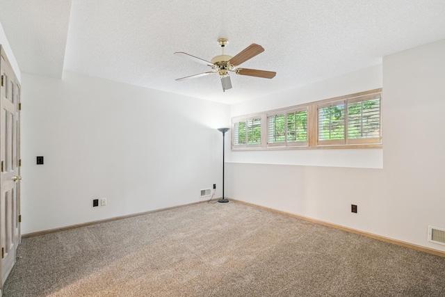 7005 Valley View Rd, Edina, MN 55439 - spare room with a ceiling fan, carpet floors, and a textured ceiling