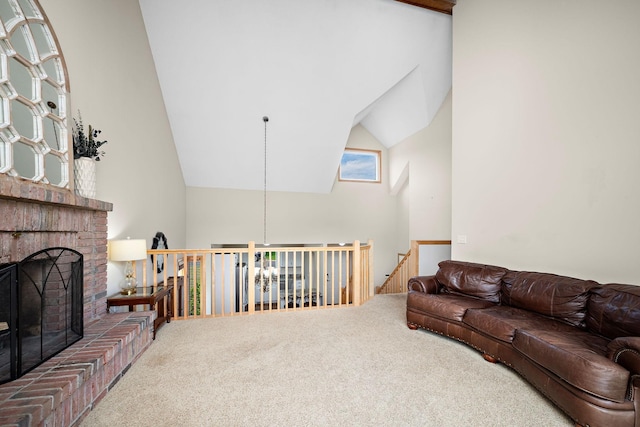 16391 Adret Ct, Eden Prairie, MN 55346 - carpeted living room featuring high vaulted ceiling and a brick fireplace