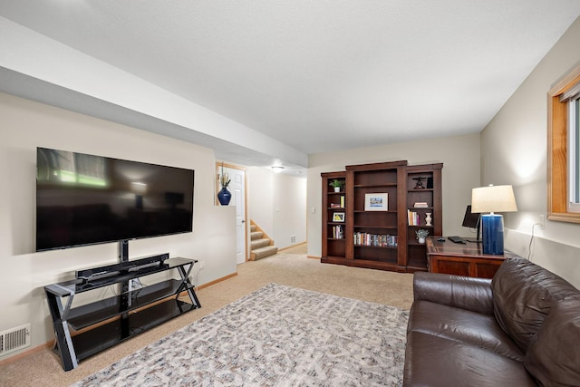 16391 Adret Ct, Eden Prairie, MN 55346 - carpeted living room featuring stairway and baseboards