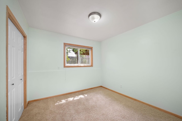 16391 Adret Ct, Eden Prairie, MN 55346 - unfurnished bedroom featuring a closet and carpet flooring