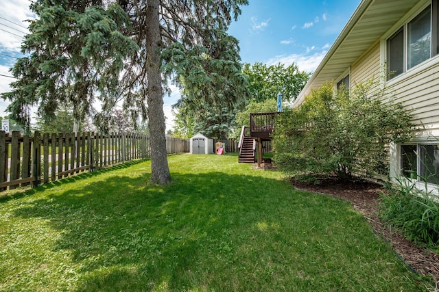 16391 Adret Ct, Eden Prairie, MN 55346 - fenced backyard featuring a shed, stairs, and a wooden deck