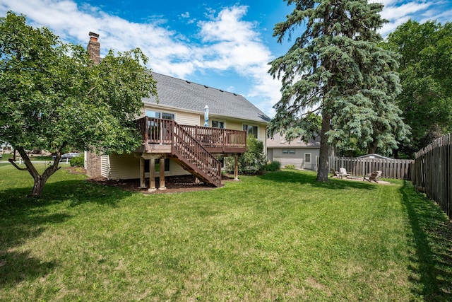 16391 Adret Ct, Eden Prairie, MN 55346 - back of house with a wooden deck, stairs, a fenced backyard, and a chimney