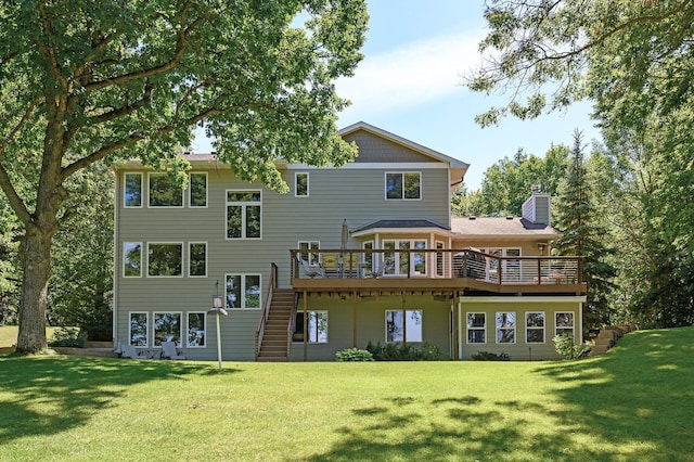 27858 Nathan Ln, Chisago Lake Twp, MN 55045 - back of house with a wooden deck, a yard, stairway, and a chimney