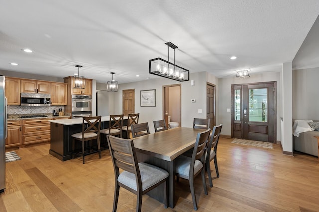 27858 Nathan Ln, Chisago Lake Twp, MN 55045 - dining space with light wood-type flooring and recessed lighting