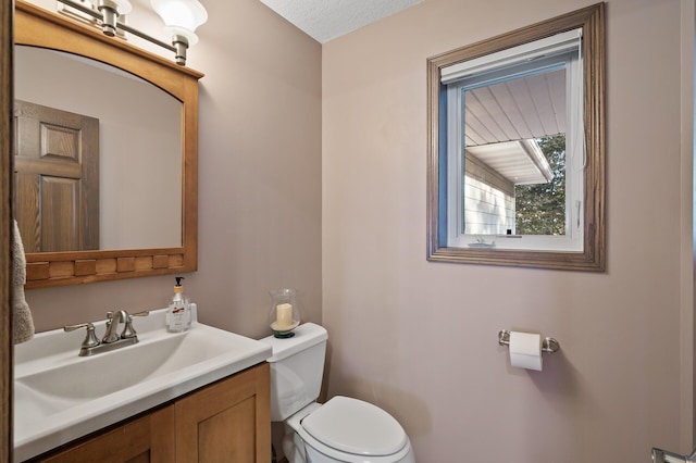 27858 Nathan Ln, Chisago Lake Twp, MN 55045 - half bathroom featuring toilet and vanity