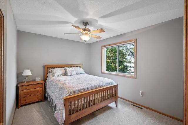 27858 Nathan Ln, Chisago Lake Twp, MN 55045 - bedroom featuring carpet floors, a ceiling fan, and a textured ceiling