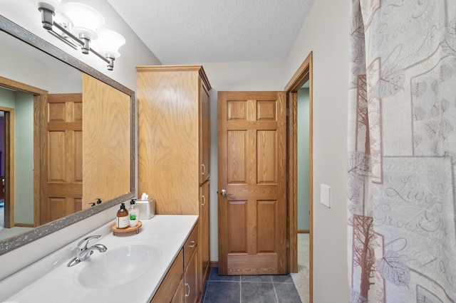 27858 Nathan Ln, Chisago Lake Twp, MN 55045 - full bath with vanity, tile patterned floors, and a textured ceiling
