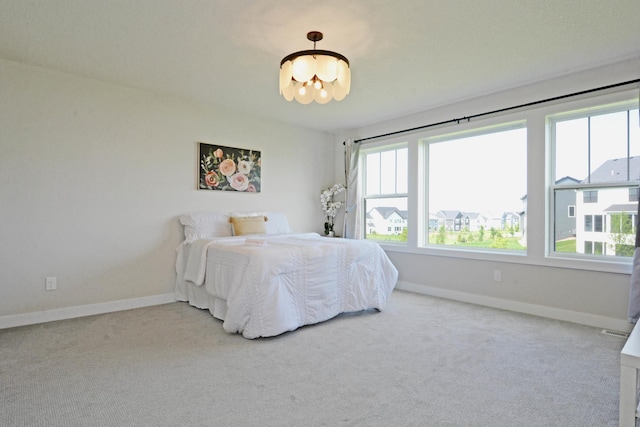 5120 Coronado Dr, Woodbury, MN 55129 - bedroom with a chandelier and carpet flooring