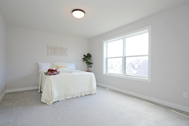 5120 Coronado Dr, Woodbury, MN 55129 - carpeted bedroom featuring baseboards