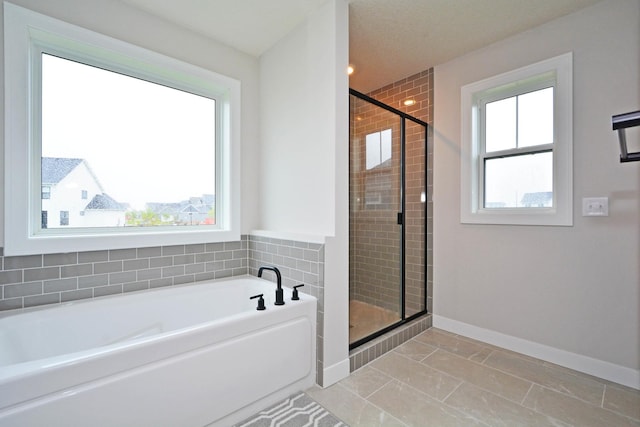 5120 Coronado Dr, Woodbury, MN 55129 - bathroom with a garden tub and a stall shower