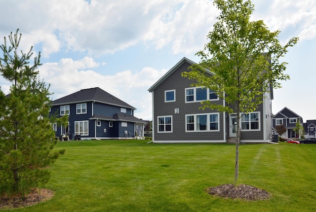 5120 Coronado Dr, Woodbury, MN 55129 - rear view of property with a lawn