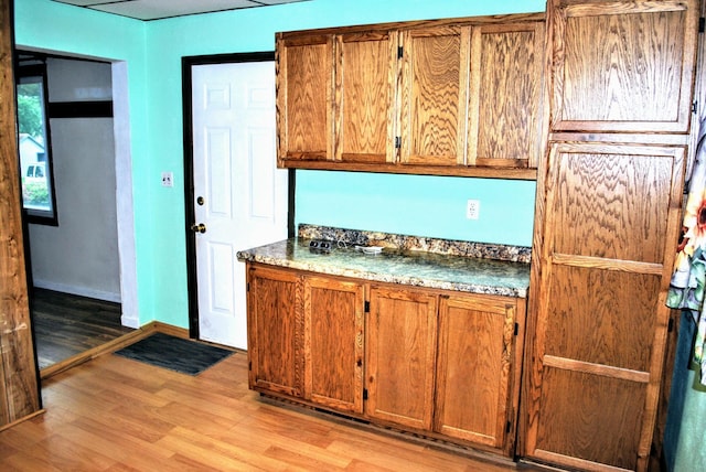 1015 Grove St, Brainerd, MN 56401 - kitchen featuring brown cabinetry and light wood-style floors