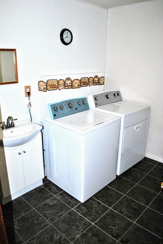 1015 Grove St, Brainerd, MN 56401 - laundry room featuring washing machine and clothes dryer and dark tile patterned flooring