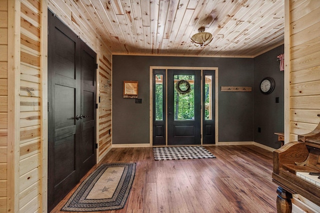 38985 337th Ln, Aitkin, MN 56431 - foyer entrance featuring dark wood-style floors and wooden ceiling