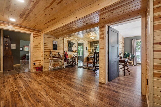 38985 337th Ln, Aitkin, MN 56431 - living room with wood finished floors, wood walls, healthy amount of natural light, wood ceiling, and recessed lighting