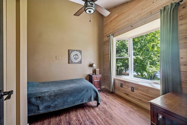 38985 337th Ln, Aitkin, MN 56431 - bedroom featuring wood walls and wood finished floors