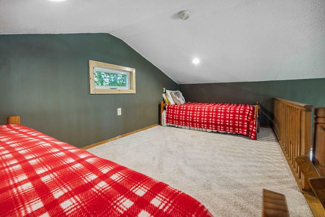 38985 337th Ln, Aitkin, MN 56431 - carpeted bedroom featuring vaulted ceiling and a textured ceiling