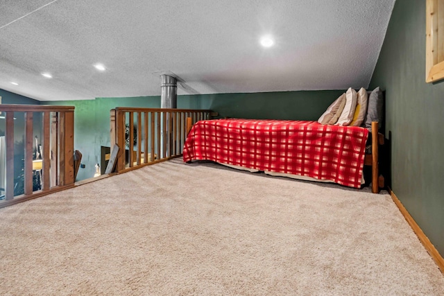 38985 337th Ln, Aitkin, MN 56431 - carpeted bedroom featuring a textured ceiling, recessed lighting, and lofted ceiling