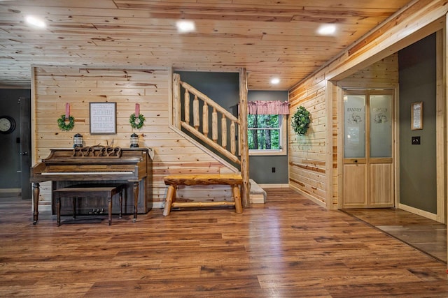 38985 337th Ln, Aitkin, MN 56431 - entryway featuring wooden walls, wood finished floors, stairs, wooden ceiling, and recessed lighting