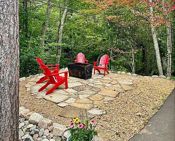 38985 337th Ln, Aitkin, MN 56431 - view of patio / terrace with a fire pit