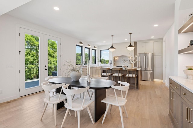 4404 58th St, Edina, MN 55424 - dining room featuring light wood-style flooring and recessed lighting