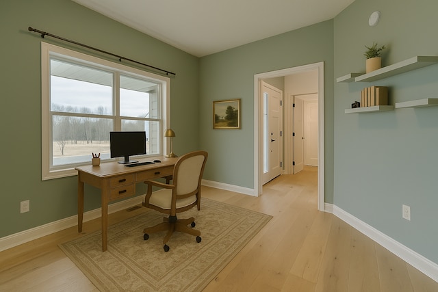 917 174th Ave NE, Ham Lake, MN 55304 - office area featuring light wood finished floors and baseboards