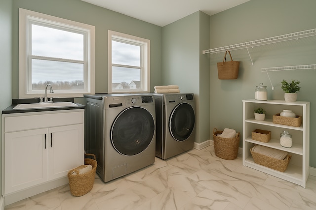 917 174th Ave NE, Ham Lake, MN 55304 - laundry area with light marble finish floors, separate washer and dryer, and cabinet space